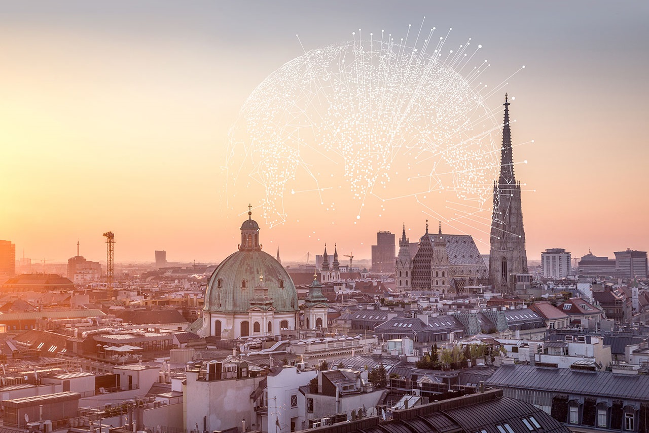 Ein Blick über Wien samt Stephansdom und Karlskirche in der Abenddämmerung - Aktienfonds